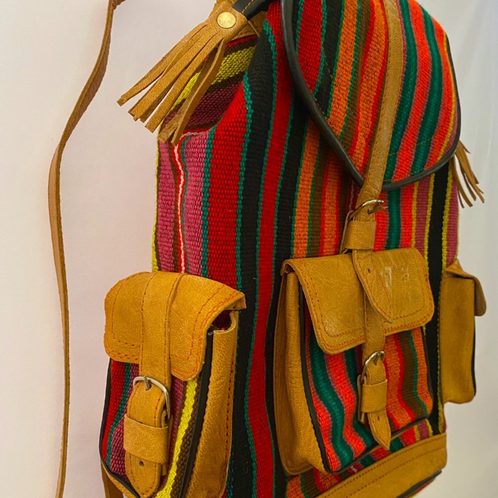 Afghan handmade organic leather bag. 25% will be donated to needy people.